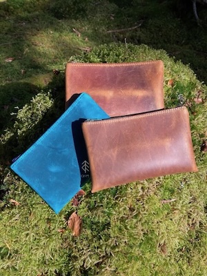 pochettes zippées cuir